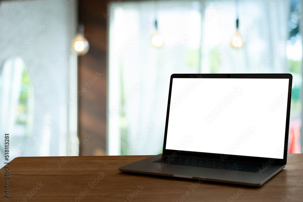laptop with screen on wooden table laptop with screen on wooden table