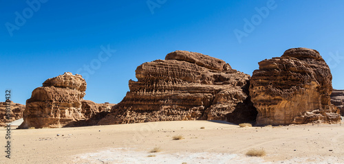 White Canyon in Sinai. Yellow and orange sandstone textured carved mountain  bright blue sky. Egyptian desert landscape. Sinai peninsula  Egypt