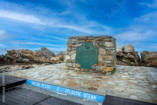 Cape Agulhas is the southernmost part of Africa in South Africa that divides the Atlantic and Indian Oceans, these deep, rough and cold waters are ideal for marine species. photo