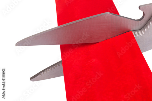 scissors cut isolated on white background red ribbon paper