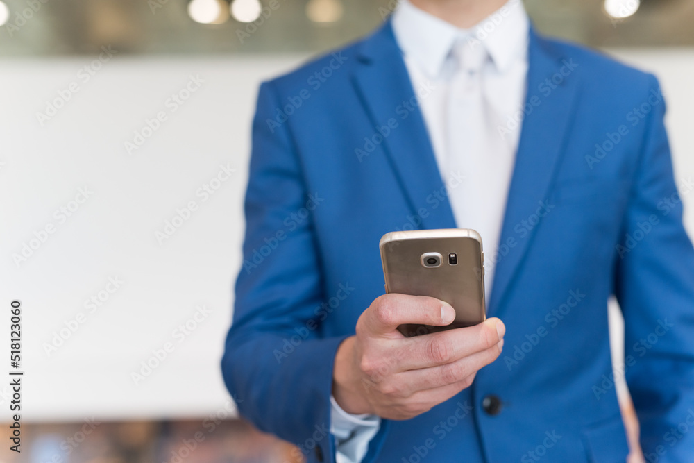 Business man using his mobile phone Business man using his mobile phone