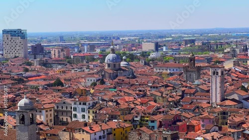 Brescia red roofs and domes from Cidneo Hill, Italy photo