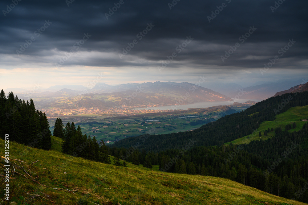 Obraz premium view from Gurnigel towards Thun and Lake Thun at a summer sunset