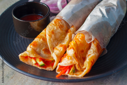 Cuadro en lienzo delicious Indian street food egg rolls is ready to eat.