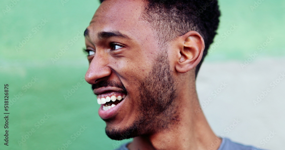 Relaxed black mixed race man outside close-up face