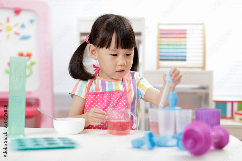 young  girl making ice lolly for homeschooling