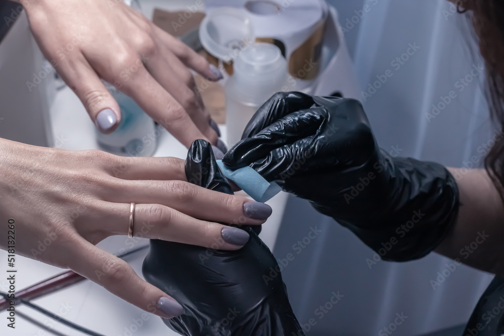 The process of manicure in a beauty salon close-up The process of manicure in a beauty salon close-up