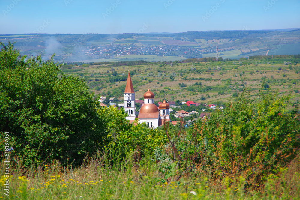 Φωτογραφία Moldova. Trusheny. View of the village and the village temple.