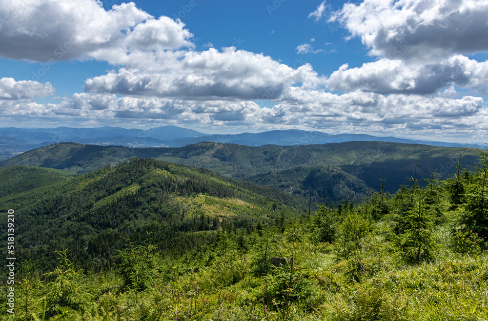 Mountain landscape against blue sky and white clouds Mountain landscape against blue sky and white clouds