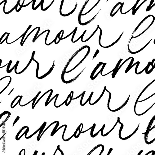 Seamless pattern with Love phrase in French language. Romantic pattern with calligraphy text. Handwritten word Love. Valentine's Day greeting card, poster, wrapping paper. Black vector lettering.