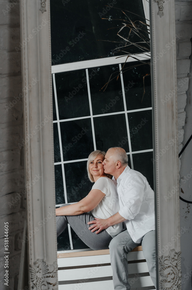 photo session of a man with his wife in a photo studio photo session of a man with his wife in a photo studio