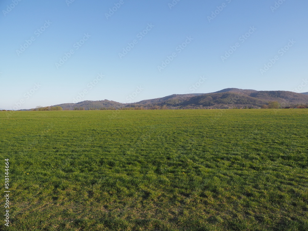 Lawn and Silesian Beskid Mountains in Bielsko-Biala city, Poland