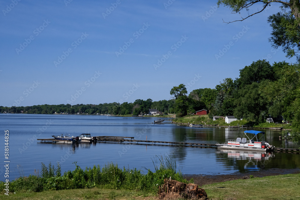 boats , docks and cottages on Rice Lake Ontario