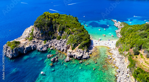 Fototapeta Naklejka Na Ścianę i Meble -  Corfu island best beaches, Greece . Aerial drone view of beautiful double beach with turquoise clear waters Limni beach Glyko near Paleokastritsa.