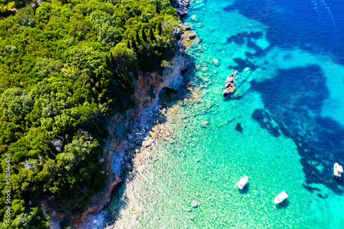 Corfu island, Greece . Aerial drone view of beautiful double beach with turquoise clear waters Limni beach Glyko near Paleokastritsa.