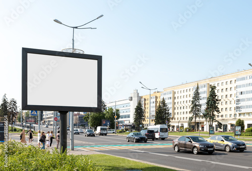 Large billboard mockup along city highway. Brand, product, service, business ad in high traffic area. Hoarding. Promotion information for marketing announcements and details. High quality photo