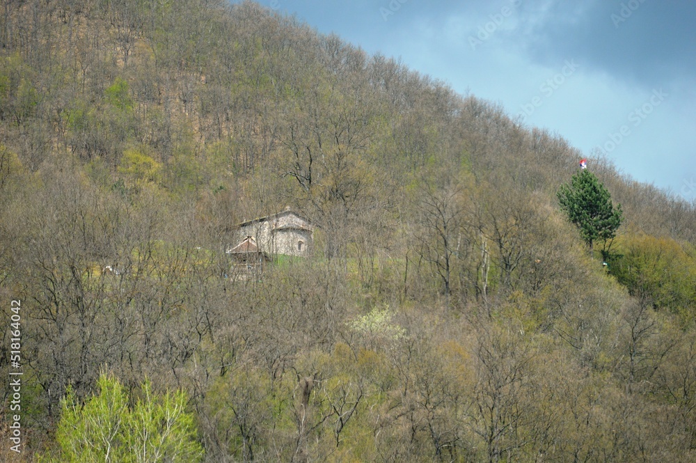 old small stone church on the hill