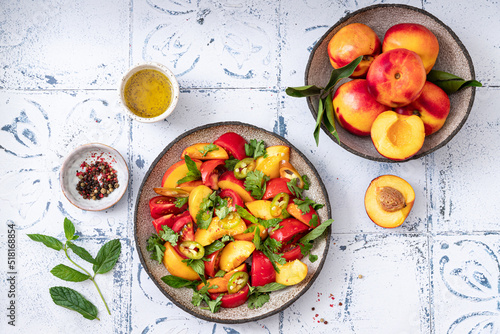 Fresh spicy salad with tomatoes and nectarines