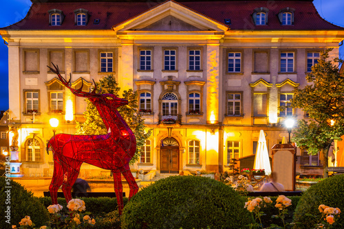 A glass deer as the emblem of the Jelenia Gora city on the Town Hall Square at dusk. Poland © Patryk Kosmider