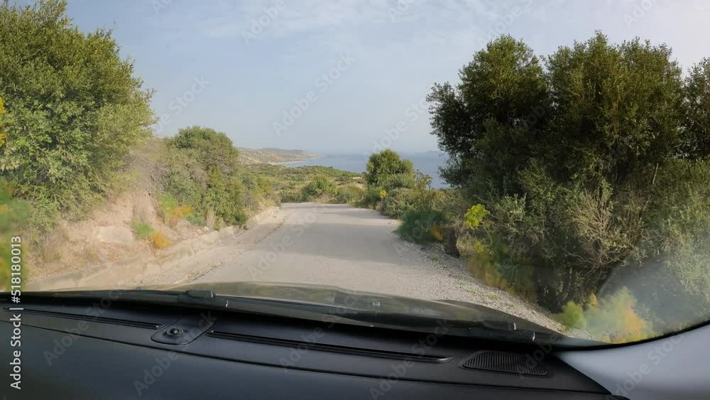 POV of driving on a road in Crete, Greece in UHD resolution POV of driving on a road in Crete, Greece in UHD resolution