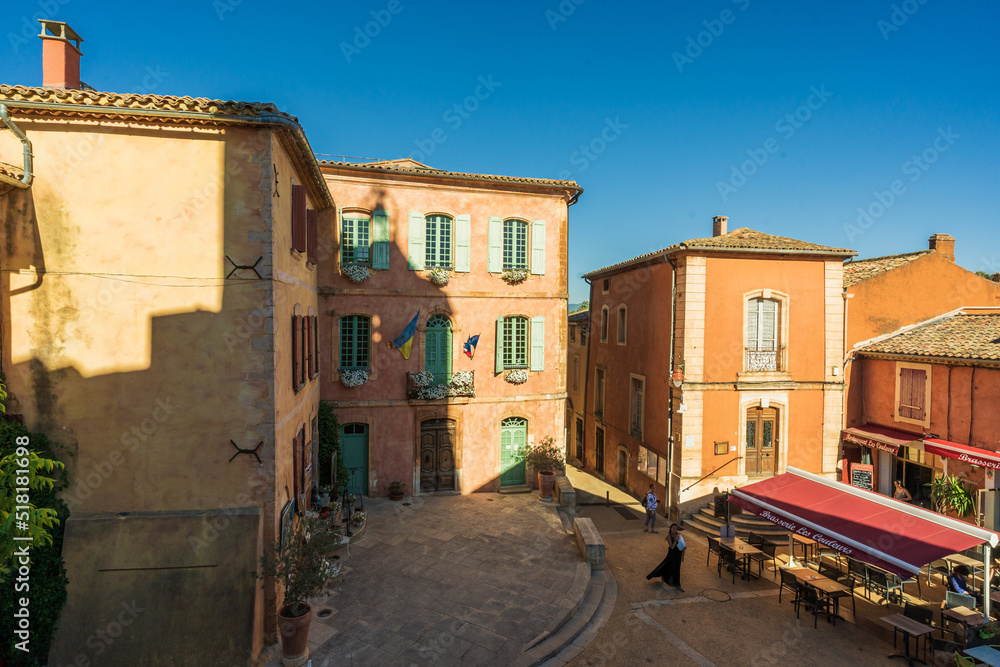 Street view of the small town of Roussillon, the red clay city in Provence, South France