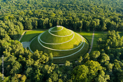 Aerial view of the famous Pilsudski's Mound in a sunny summer day, an artificial mound located in the western part of Krakow, on the Sowiniec Heights. photo