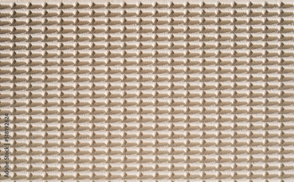The back side of the ceramic finishing tile. Background The back side of the ceramic finishing tile. Background