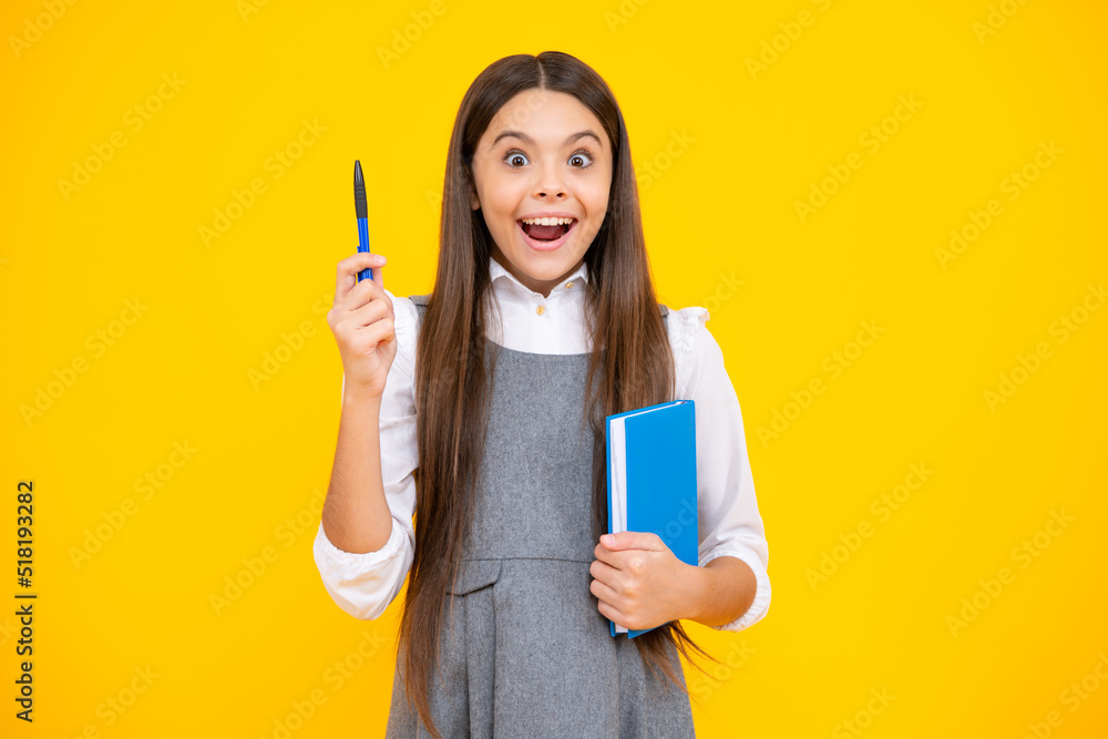 Excited face. Teen girl pupil hold books, notebooks, isolated on yellow background, copy space. Back to school, teenage lifestyle, education and knowledge. Amazed expression, cheerful and glad. Excited face. Teen girl pupil hold books, notebooks, isolated on yellow background, copy space. Back to school, teenage lifestyle, education and knowledge. Amazed expression, cheerful and glad.