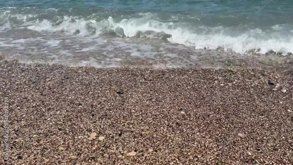 waves crashing on the shore, sea wave. coast lined with natural stones. waves crashing on the shore, sea wave. coast lined with natural stones.