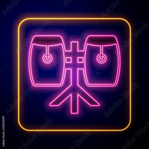 Glowing neon Conga drums icon isolated on black background. Musical instrument. Vector