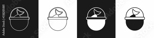 Set Fishing bucket with fish icon isolated on black and white background. Fish in a bucket. Vector