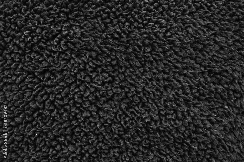 Faux fur black wool abstract pattern nature skin soft warm fluffy background dark artifical texture Faux fur black wool abstract pattern nature skin soft warm fluffy background dark artifical texture