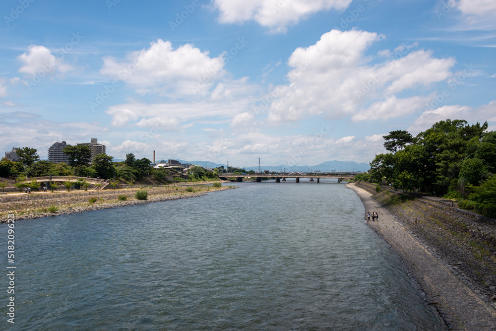 View around Asagiri bridge over Uji river in Uji, Kyoto, Japan
