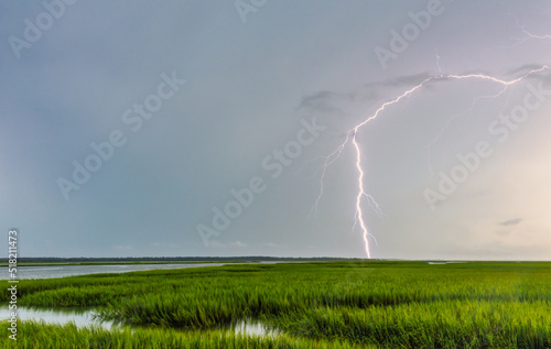 Lightning over low country marshes