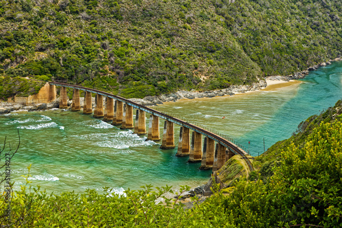 Railway bridge across Kaaimans River estuary photo