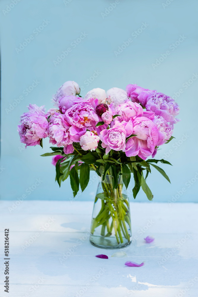 Bouquet of pink peonies on a light background. Vintage style
