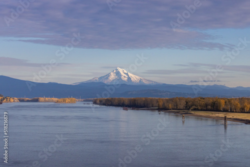 Wide view of snowcapped Mt Hood with the Columbia River and forest between Vancouver, Washington and Portland, Oregon