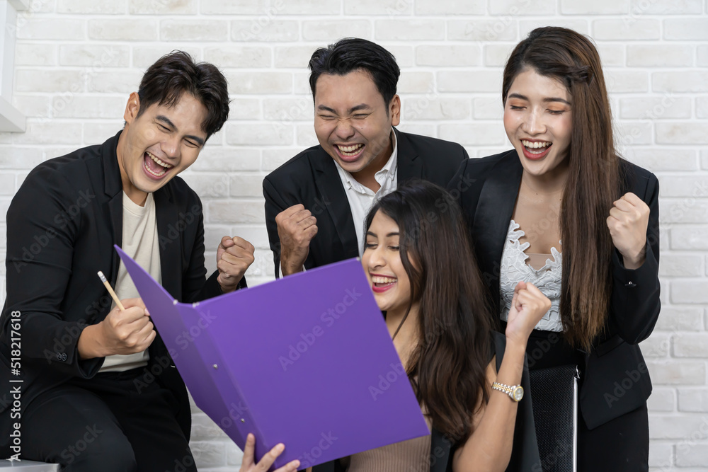Yes! Businesspeople triumphing because of the financial growth of company. Happy smiling businesspeople triumphing with raised fists. Yes! Businesspeople triumphing because of the financial growth of company. Happy smiling businesspeople triumphing with raised fists.