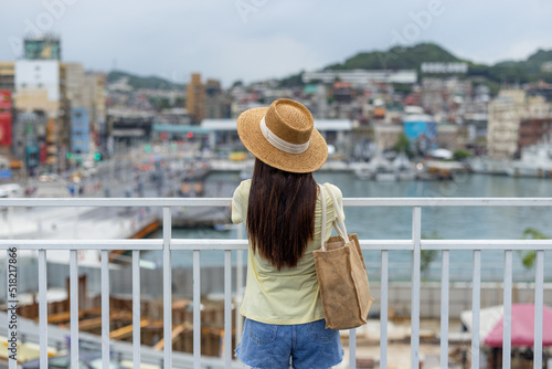 Woman look at the city in Kee Lung photo