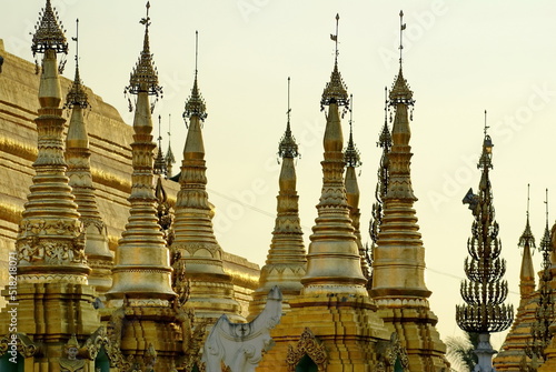 Gold tops on stupas at a Buddhist temple in Yangon  Burma
