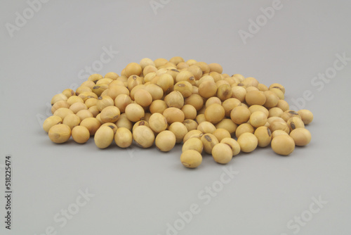 Heap of soy beans on gray background