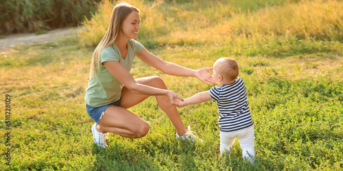 Mother teaching her little ...