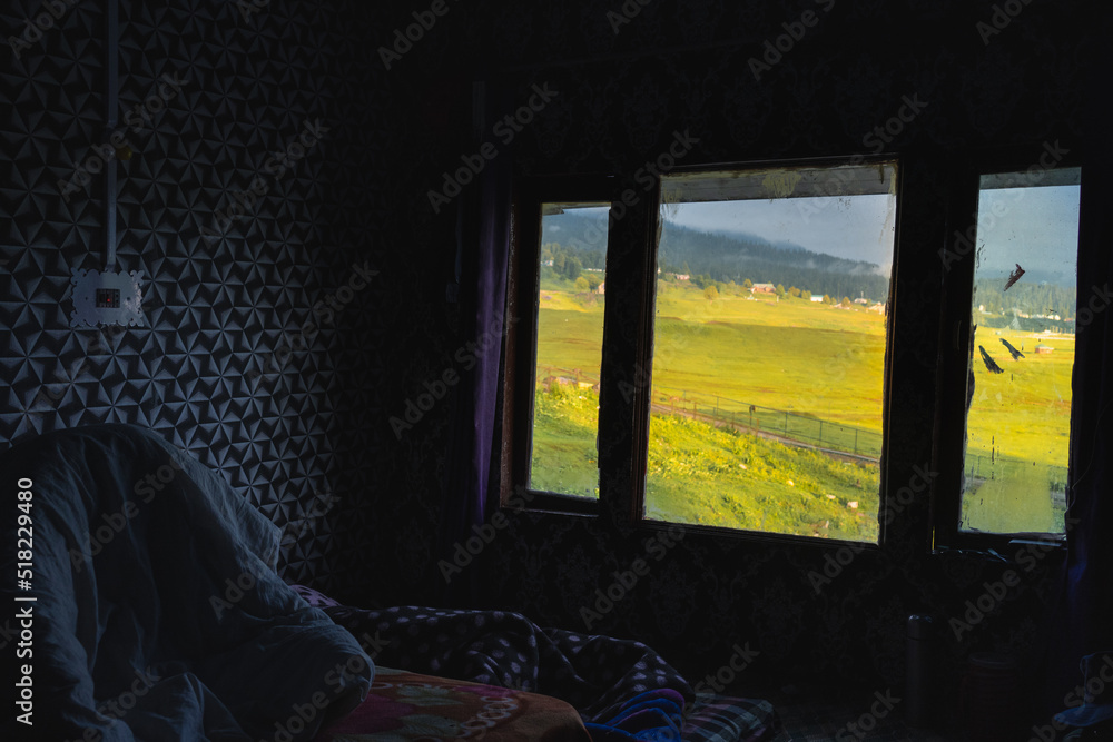 Window in the morning in Gulmarg, Jammu and Kashmir, India. Window in the morning in Gulmarg, Jammu and Kashmir, India.