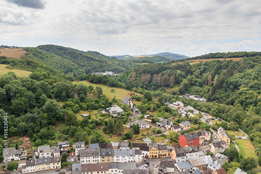 Panorama view on Eifel landscape and village Monreal with half-timber houses , Germany