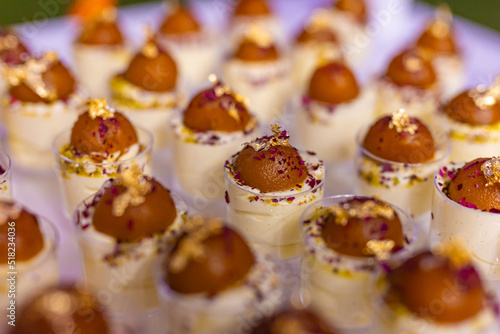 Assorted sweets, cakes and dessert close up