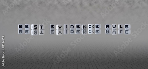 best evidence rule word or concept represented by black and white letter cubes on a grey horizon background stretching to infinity