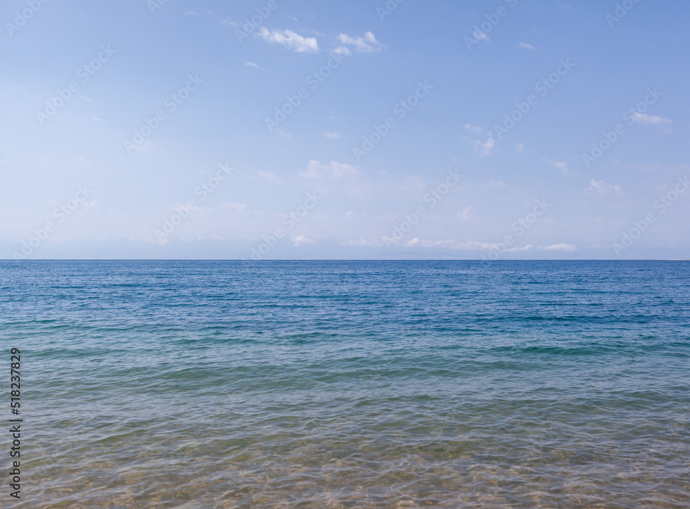 Seascape of clear water on the sea. Clear water on the ocean, sea or lake. Water ripples in the sun.