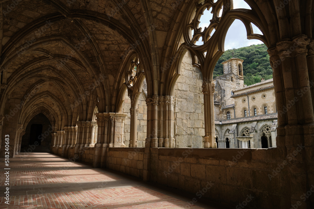 Monastery of Santa María la Real de Iranzu, abbey corridors with sculpted stone arches, Navarra, Spain.