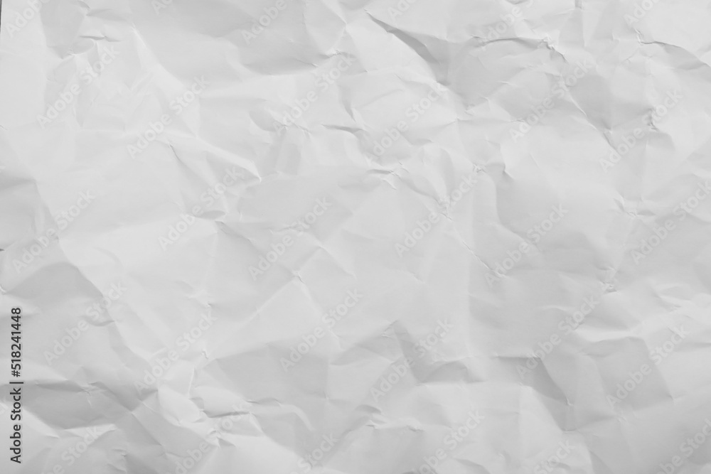 Naklejka premium Sheet of white crumpled paper as background, closeup