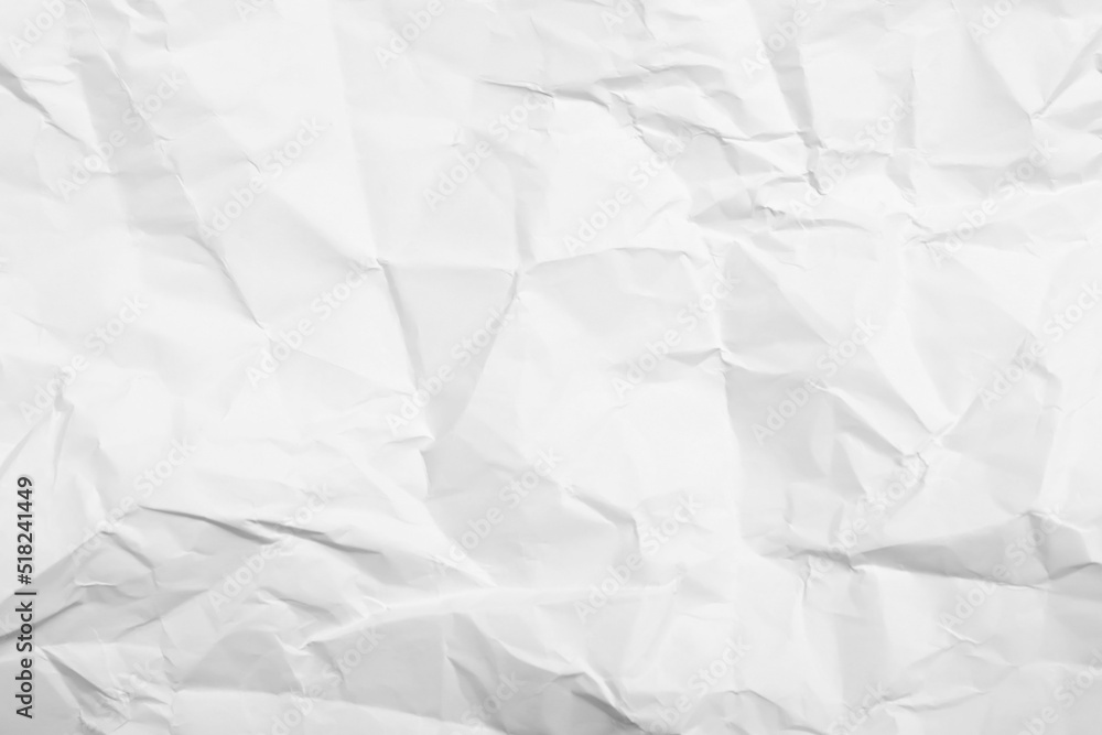 Obraz premium Sheet of white crumpled paper as background, closeup